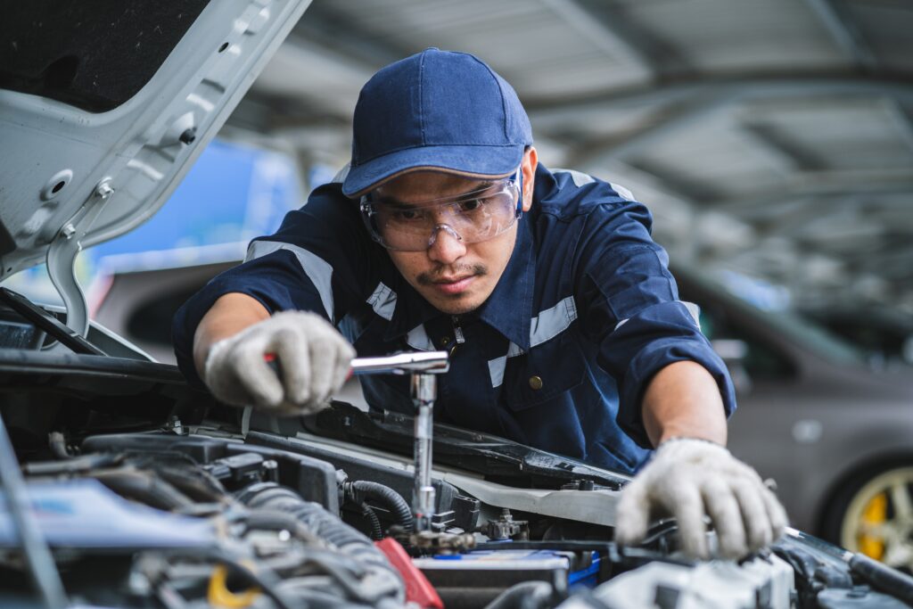 Image of a person fixing a car | hawthorn automotive improvements